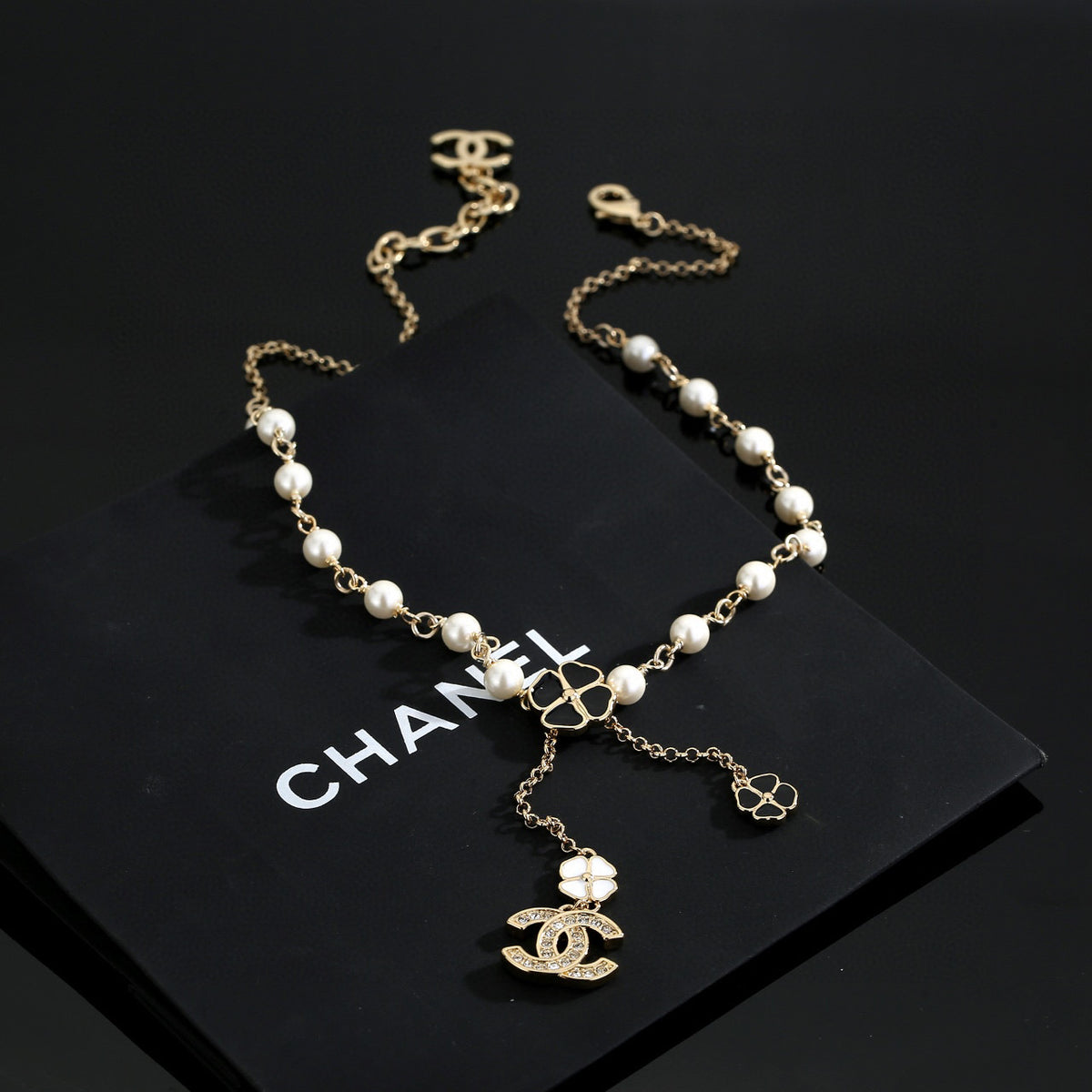 Chanel Interlocking C Pearl Letter Necklace - album image 2