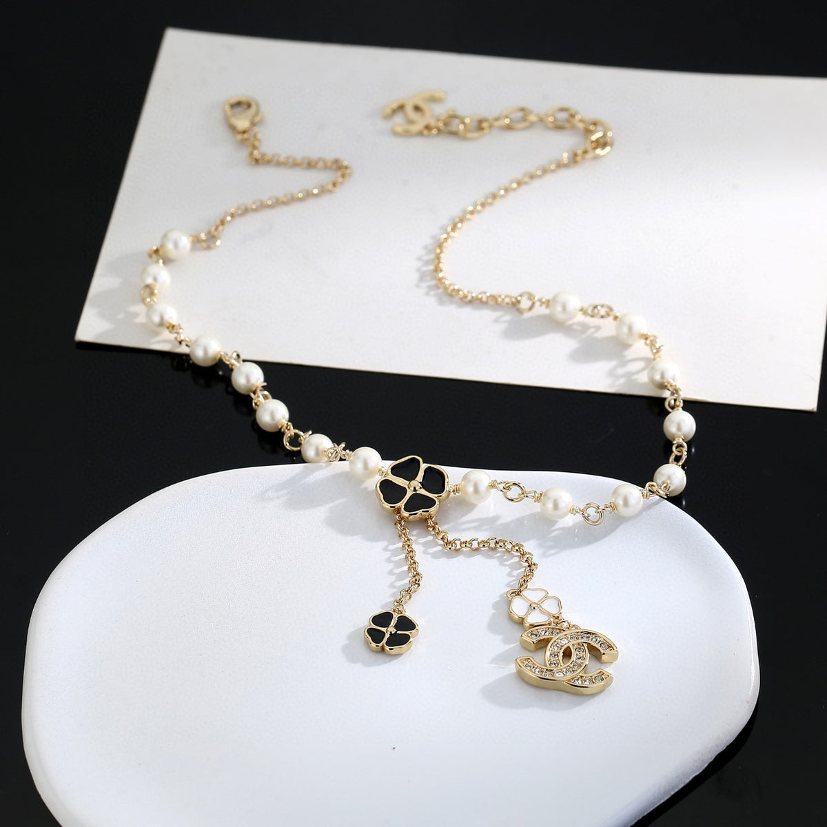 Chanel Interlocking C Pearl Letter Necklace - album image 4