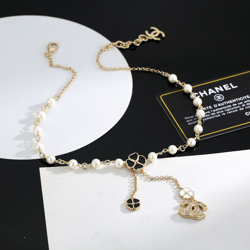Chanel Interlocking C Pearl Letter Necklace - album image 6