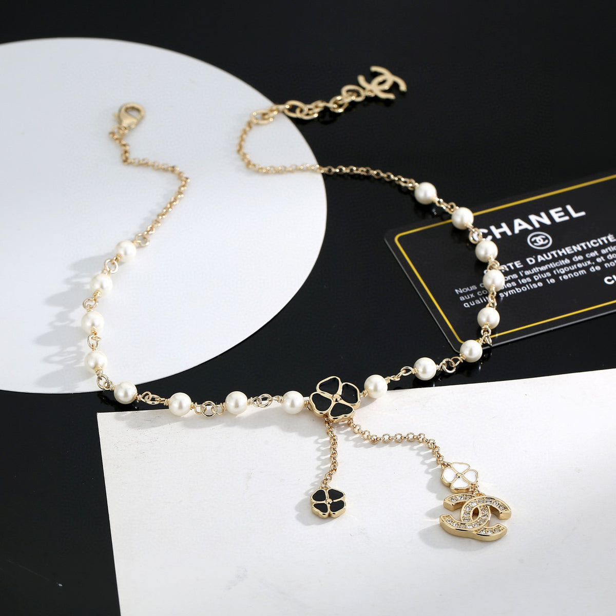 Chanel Interlocking C Pearl Letter Necklace - album image 6