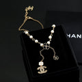 Chanel Interlocking C Pearl Letter Necklace - album image 1