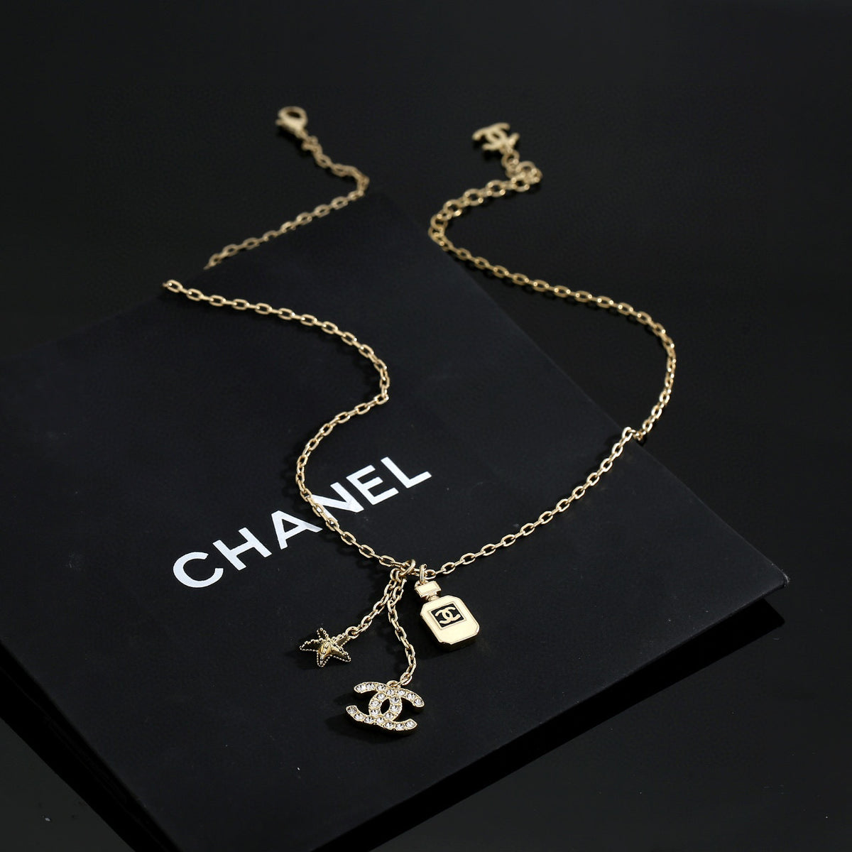 Chanel Interlocking C Perfume Bottle Letter Necklace - album image 3