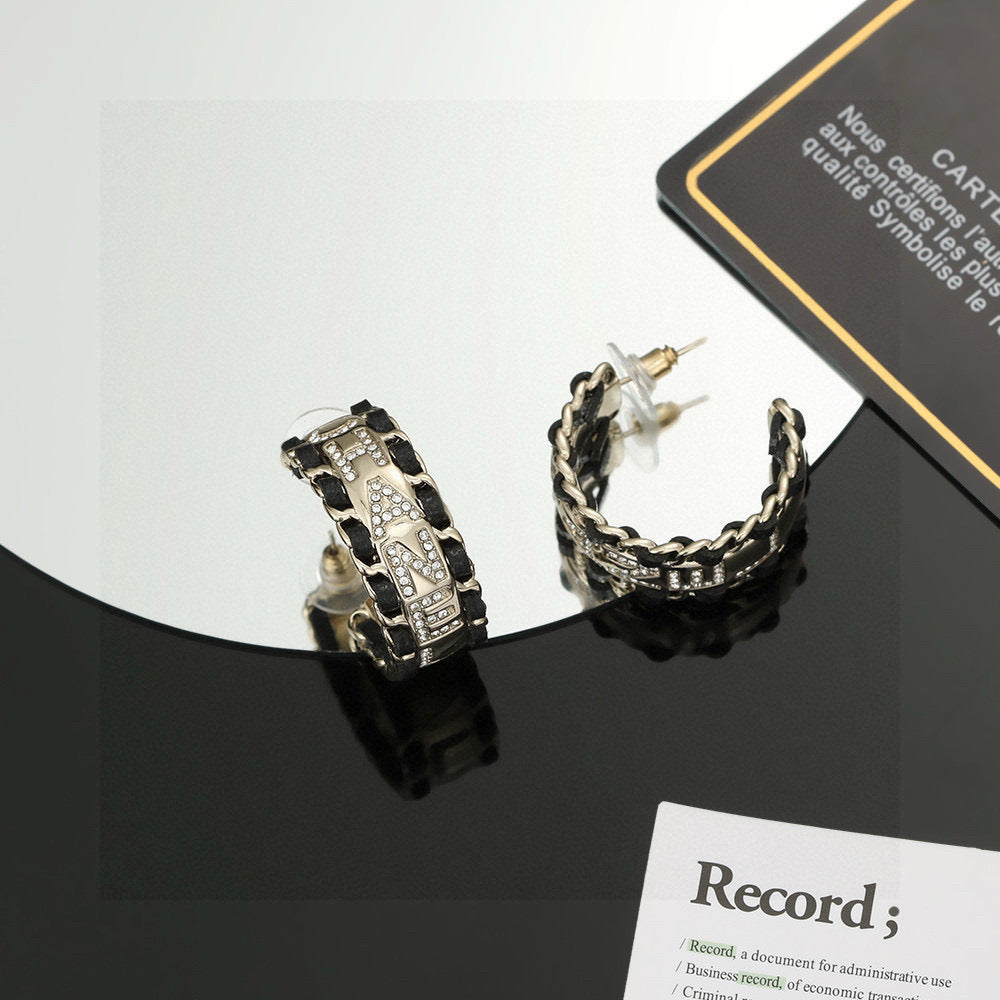 Chanel Black and Crystal Hoop Earrings - album image 1