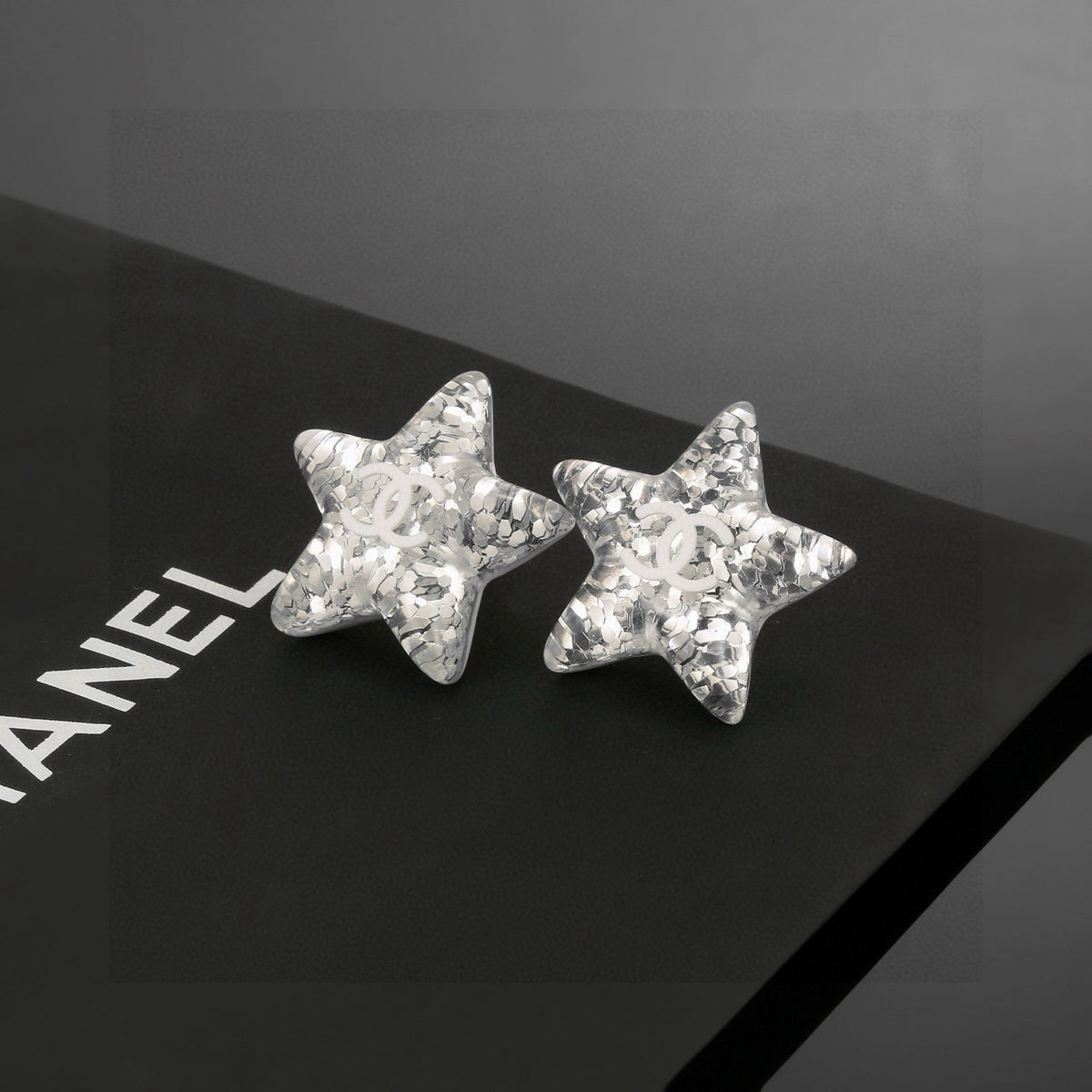 Chanel Interlocking C Resin Silver-Tone White Star Stud Earrings - album image 4