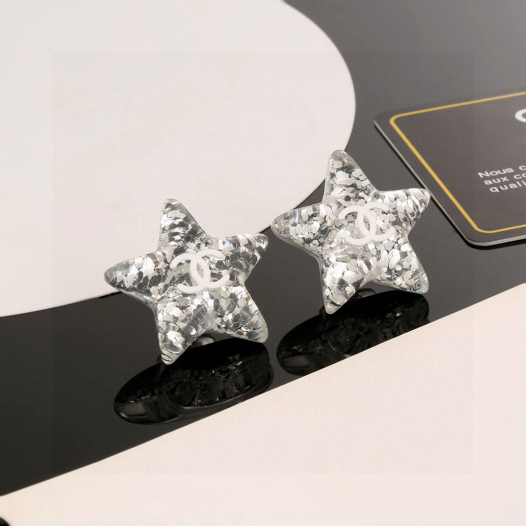 Chanel Interlocking C Resin Silver-Tone White Star Stud Earrings - album image 1