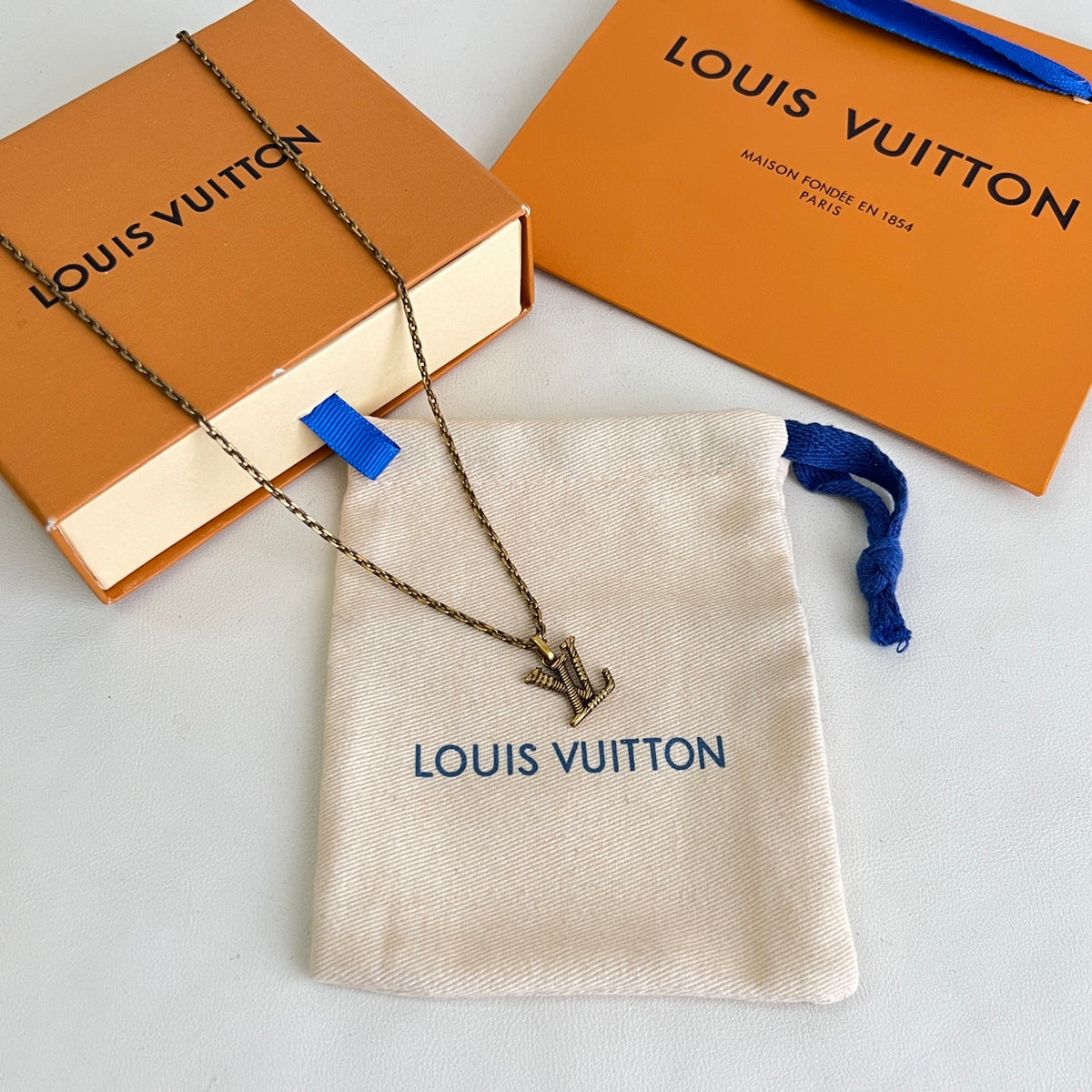 Louis Vuitton Silver-Tone Flower Pendant Necklace - album image 1