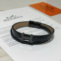 Hermès Black Leather Double-Wrap H Bracelet - album image 1