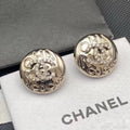 Chanel Silver-Tone Round Medallion Stud Earrings - album image 1