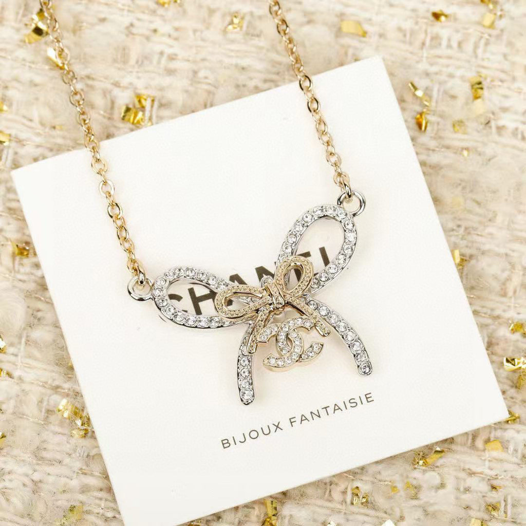 Chanel Interlocking C Bow Butterfly Necklace - album image 6