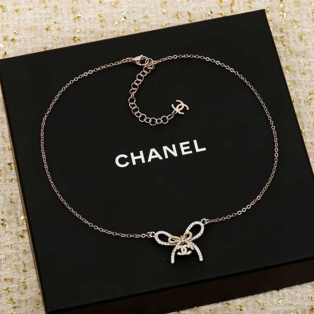 Chanel Interlocking C Bow Butterfly Necklace - album image 1