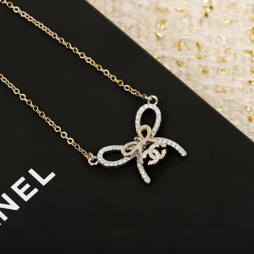 Chanel Interlocking C Bow Butterfly Necklace - album image 5