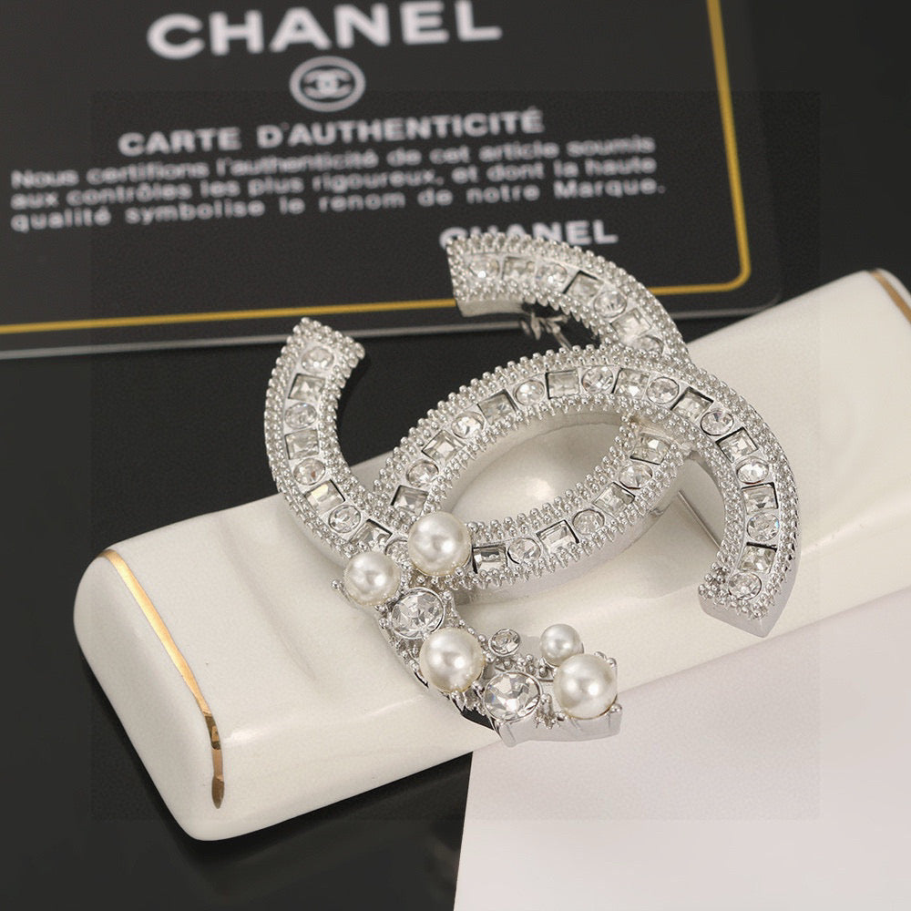 Chanel Interlocking C Pearl Brooch - album image 2