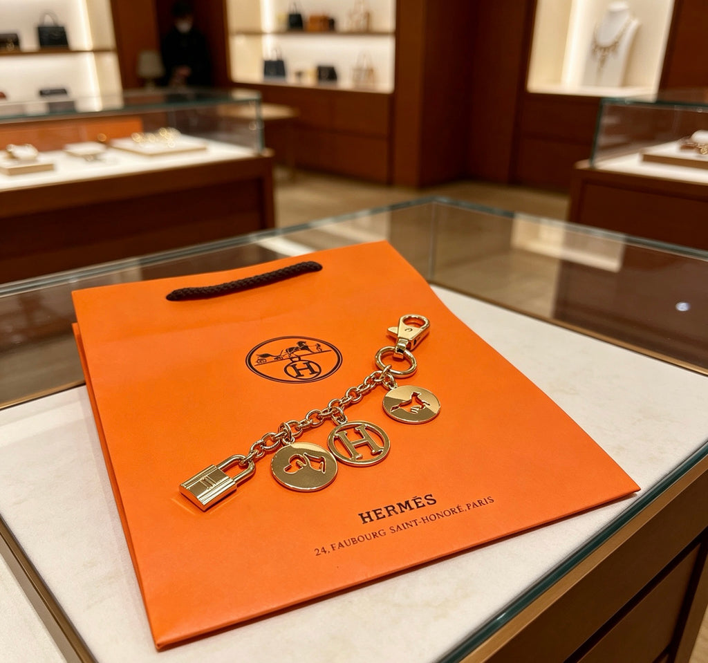 Hermès Gold-Tone H Disc Station Bracelet - album image 1