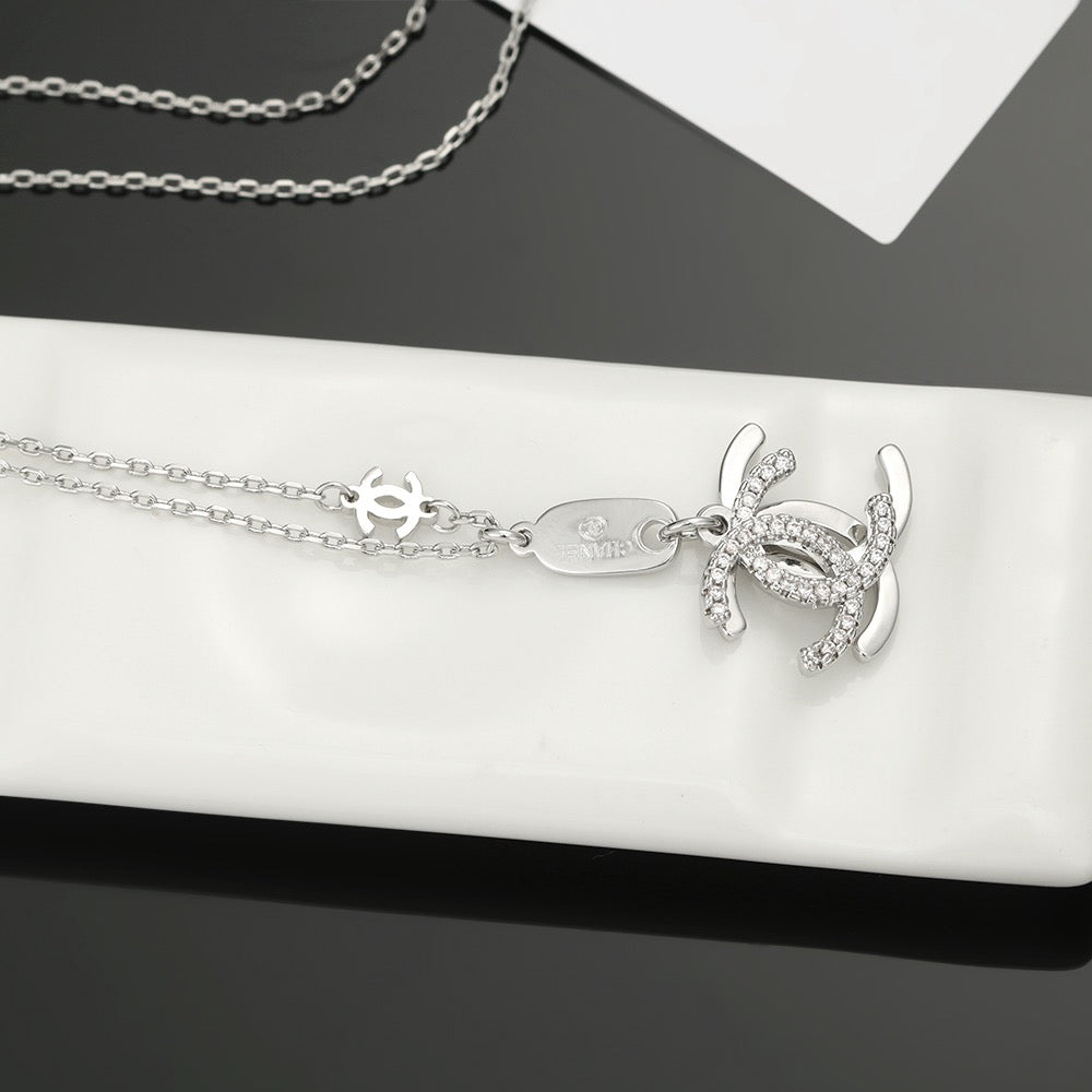 Chanel Interlocking C Two-Tone Letter Necklace - album image 5