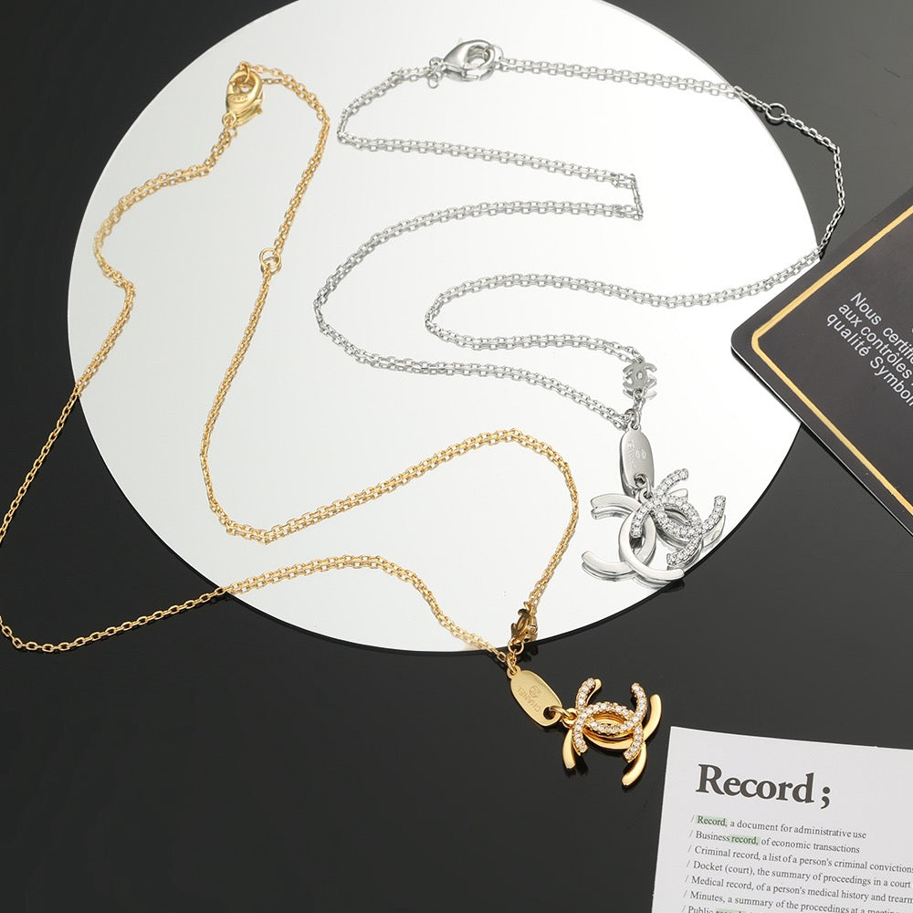 Chanel Interlocking C Two-Tone Letter Necklace - album image 1