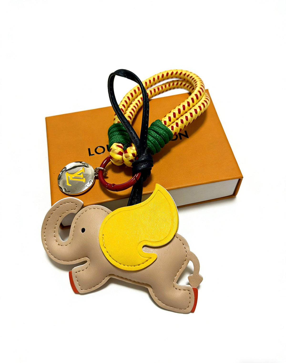 Louis Vuitton Tan and Yellow Horse Keychain - album image 1