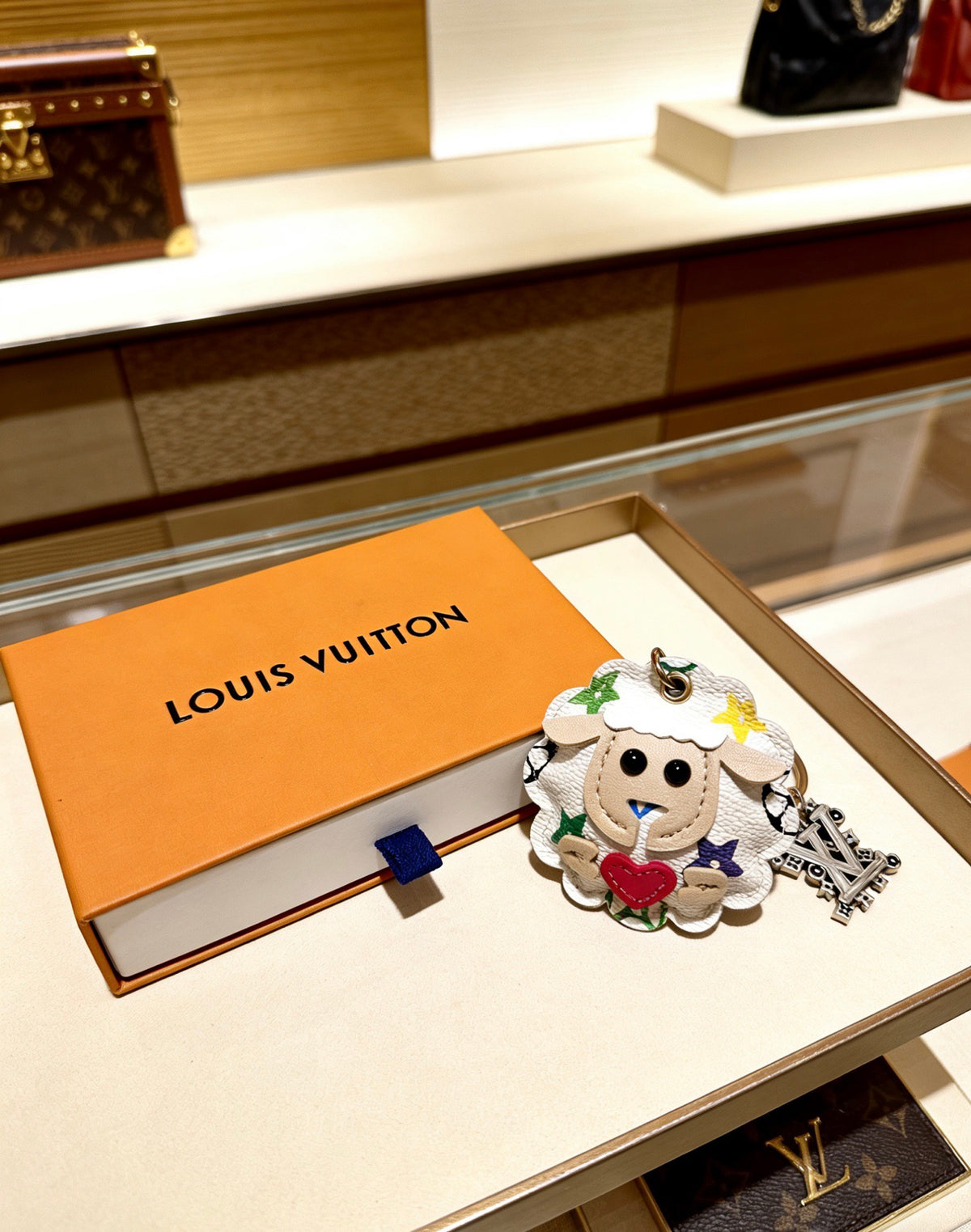 Louis Vuitton White Character Keychain with Floral Details - album image 3
