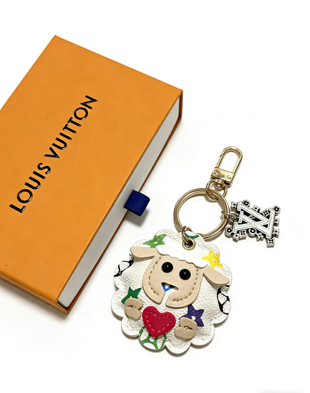 Louis Vuitton White Character Keychain with Floral Details - album image 2