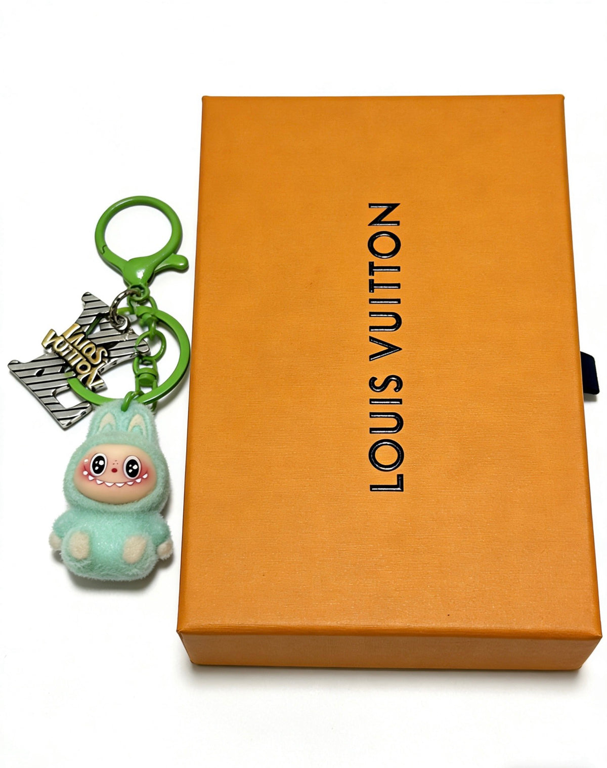 Louis Vuitton Green Character Keychain with Ring and Star Charm - album image 1