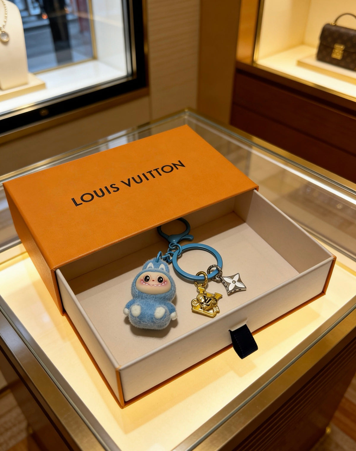 Louis Vuitton Blue Character Keychain with Ring and Star Charm - album image 5
