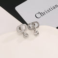 Dior Vintage-Style CD Stud Earrings - product image 1