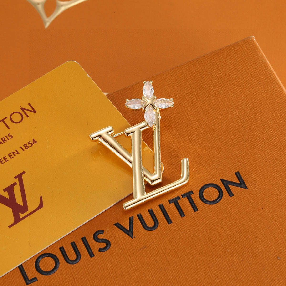 Louis Vuitton LV Letter Brooch - album image 1