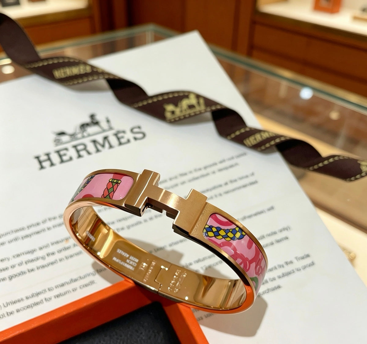 Hermès Gold-Tone Pink Printed H-Clasp Bangle - album image 1