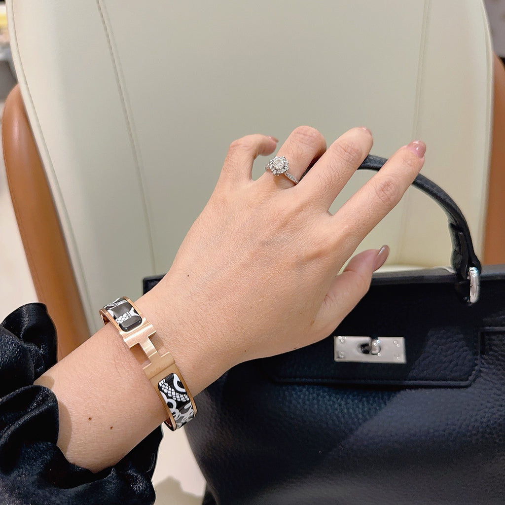 Hermès Gold-Tone Black Printed H-Clasp Bangle - album image 9