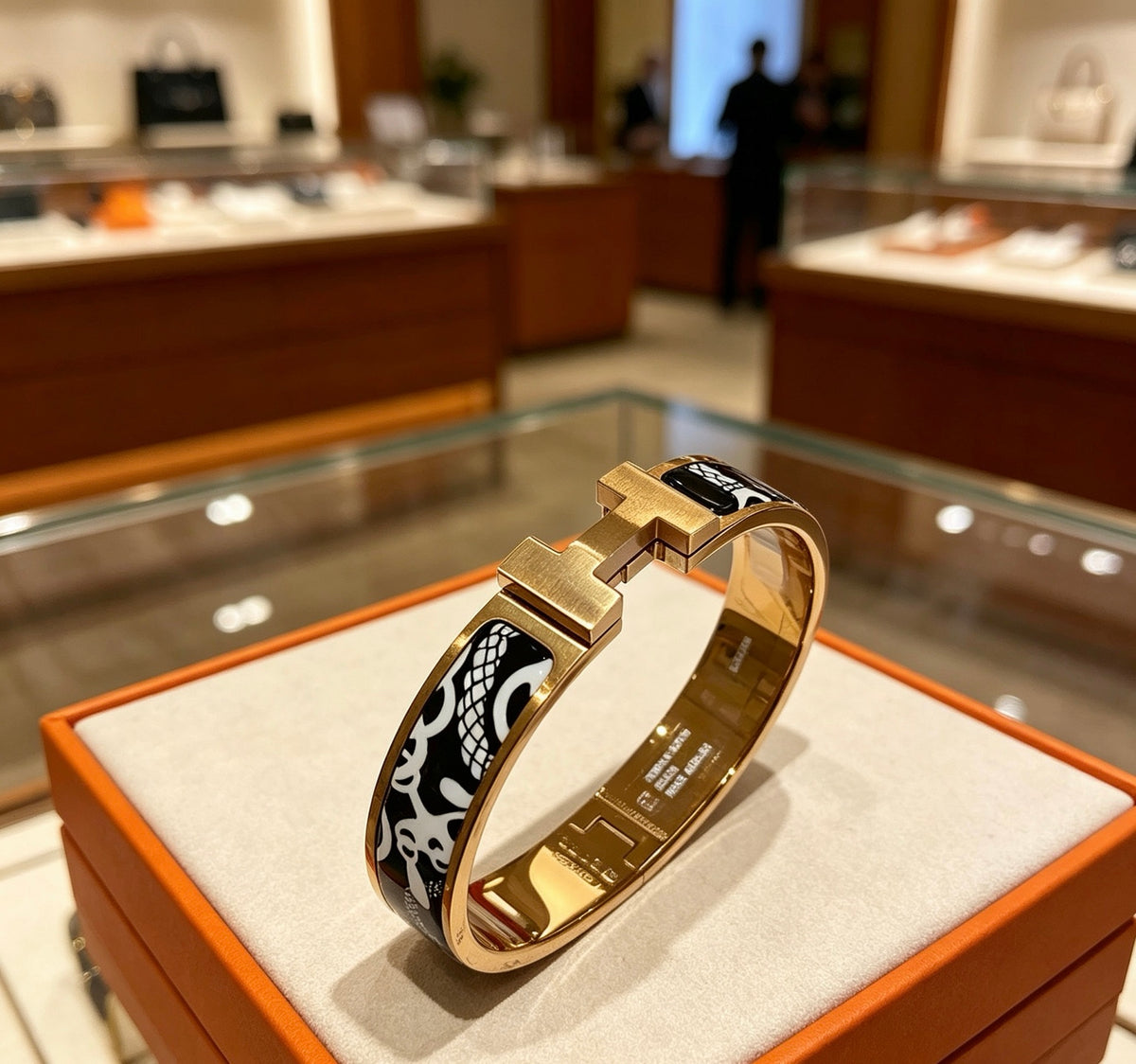Hermès Gold-Tone Black Printed H-Clasp Bangle - album image 1