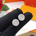 Louis Vuitton Silver-Tone Circular Earrings - album image 1