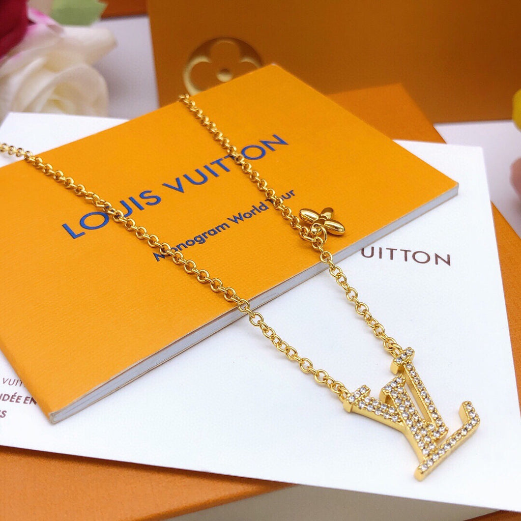 Louis Vuitton Gold-Tone Crystal Accent Necklace - album image 1