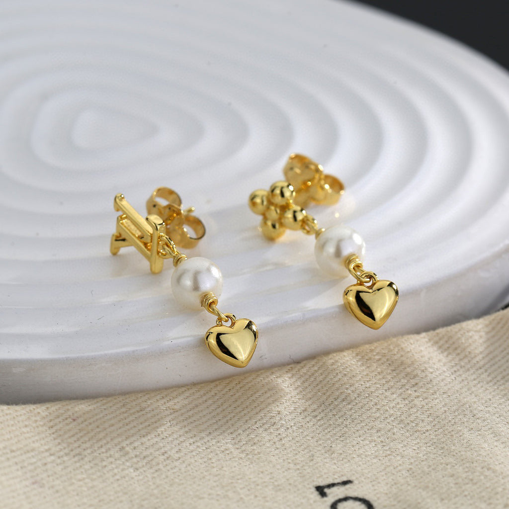 Louis Vuitton LV Letter Stud Earrings - album image 1