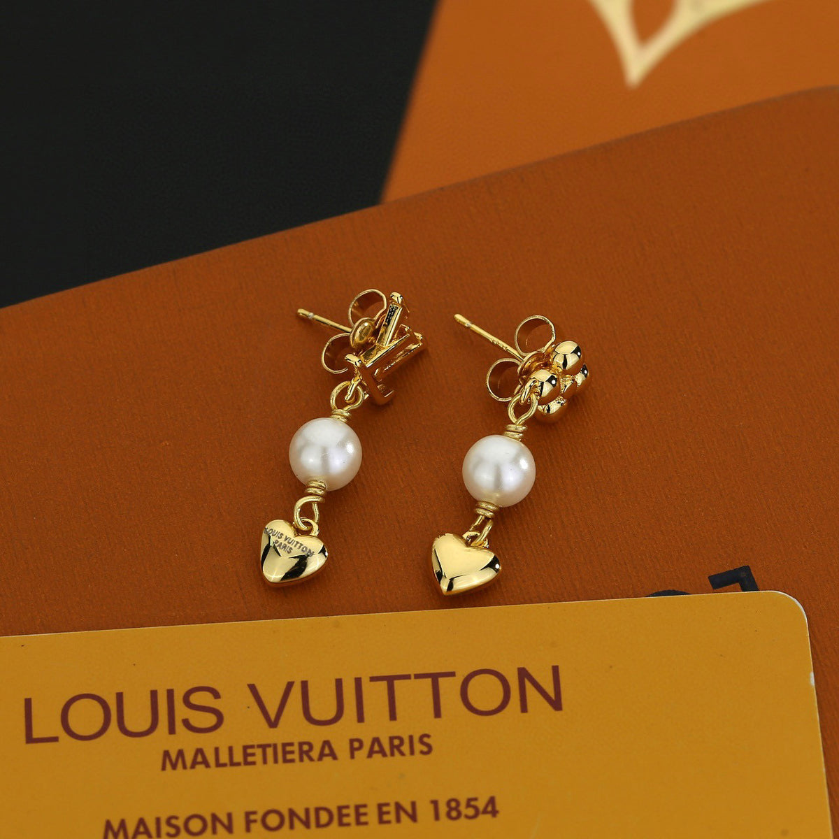 Louis Vuitton LV Letter Stud Earrings - album image 7