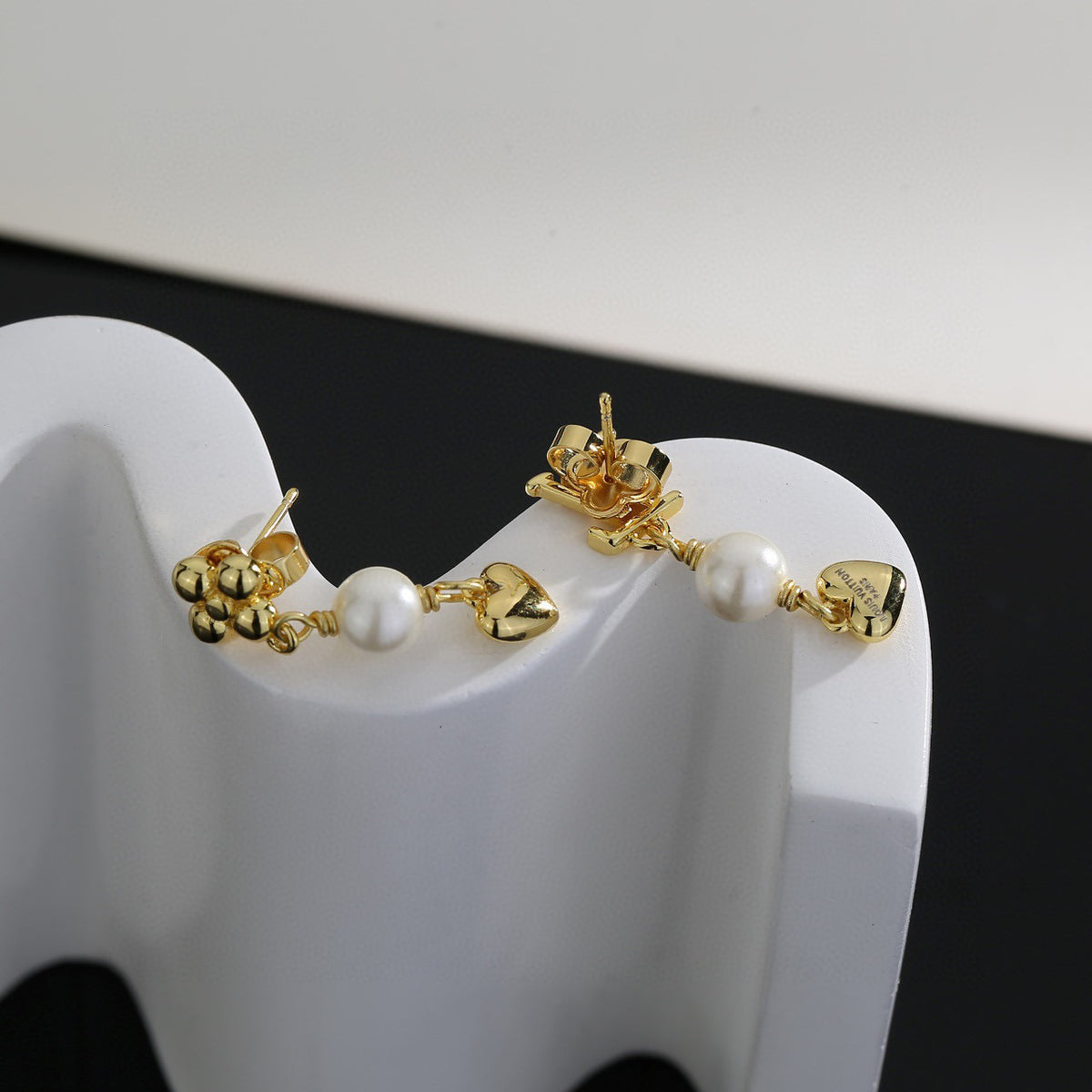 Louis Vuitton LV Letter Stud Earrings - album image 6