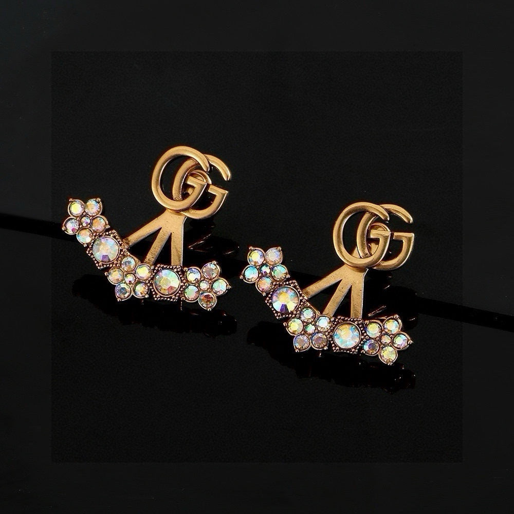 Gucci Interlocking G Gold-Tone White Pearl GG Letter Stud Earrings - album image 1
