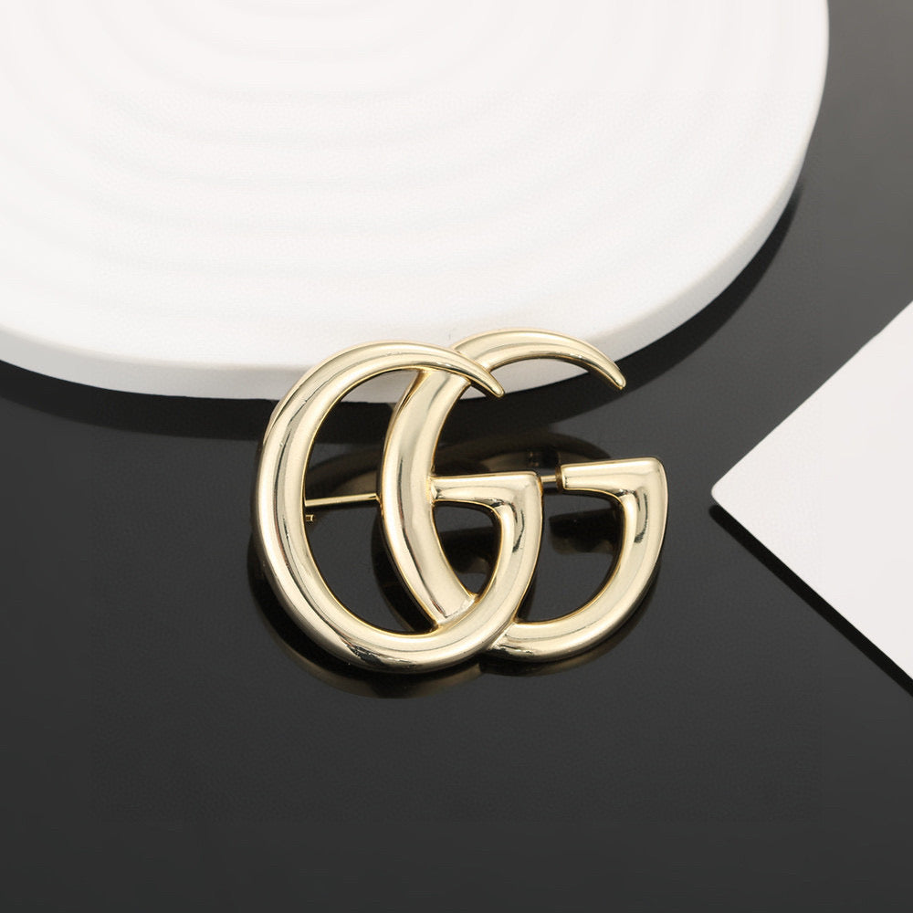 Gucci Gold-Tone Interlocking G Brooch - album image 4
