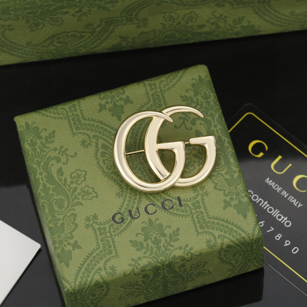Gucci Gold-Tone Interlocking G Brooch - album image 1