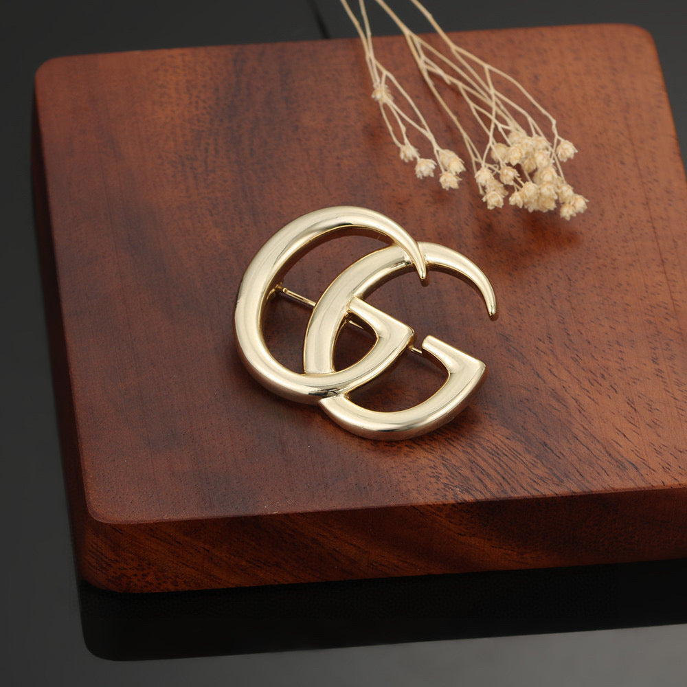 Gucci Gold-Tone Interlocking G Brooch - album image 3