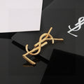 Saint Laurent Gold-Tone Branch-Textured Monogram Brooch - album image 1