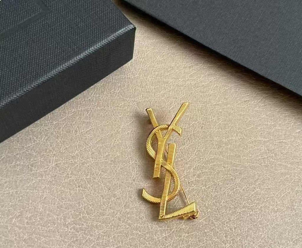 Saint Laurent Gold-Tone Ribbed Monogram Brooch - album image 2