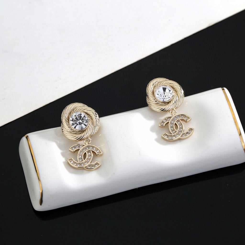 Chanel Interlocking C Gold-Tone Stud Earrings - album image 7