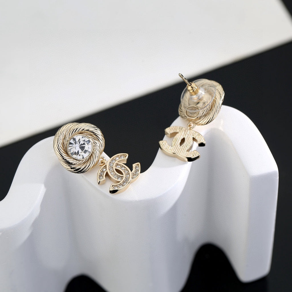 Chanel Interlocking C Gold-Tone Stud Earrings - album image 4