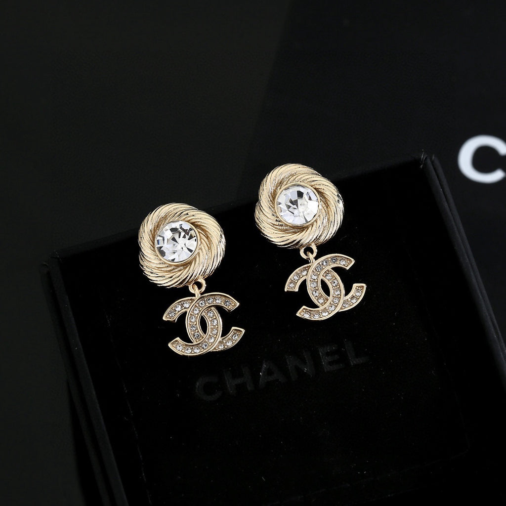 Chanel Interlocking C Gold-Tone Stud Earrings - album image 1