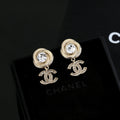 Chanel Interlocking C Gold-Tone Stud Earrings - album image 1