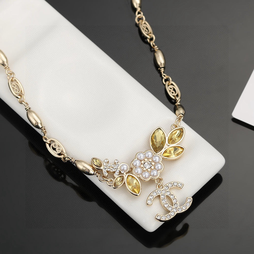 Chanel Camellia Gold-Tone Letter Necklace - album image 9