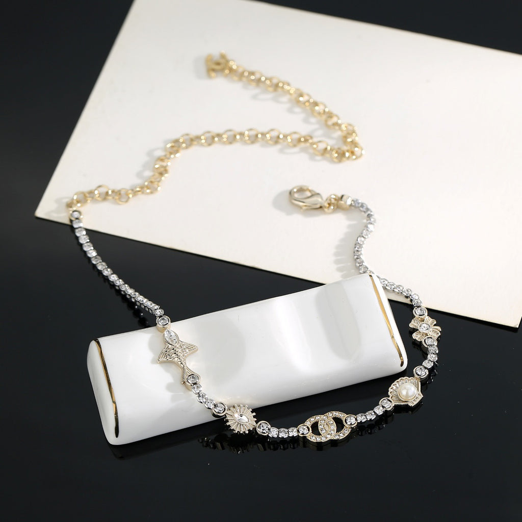 Chanel Interlocking C Shell Gold-Tone Pearl Pendant Necklace - album image 4