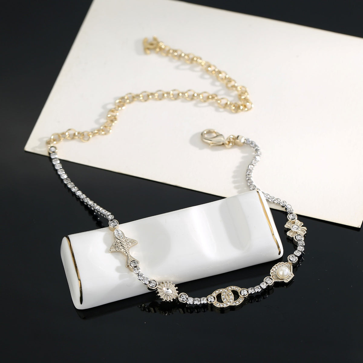 Chanel Interlocking C Shell Gold-Tone Pearl Pendant Necklace - album image 4