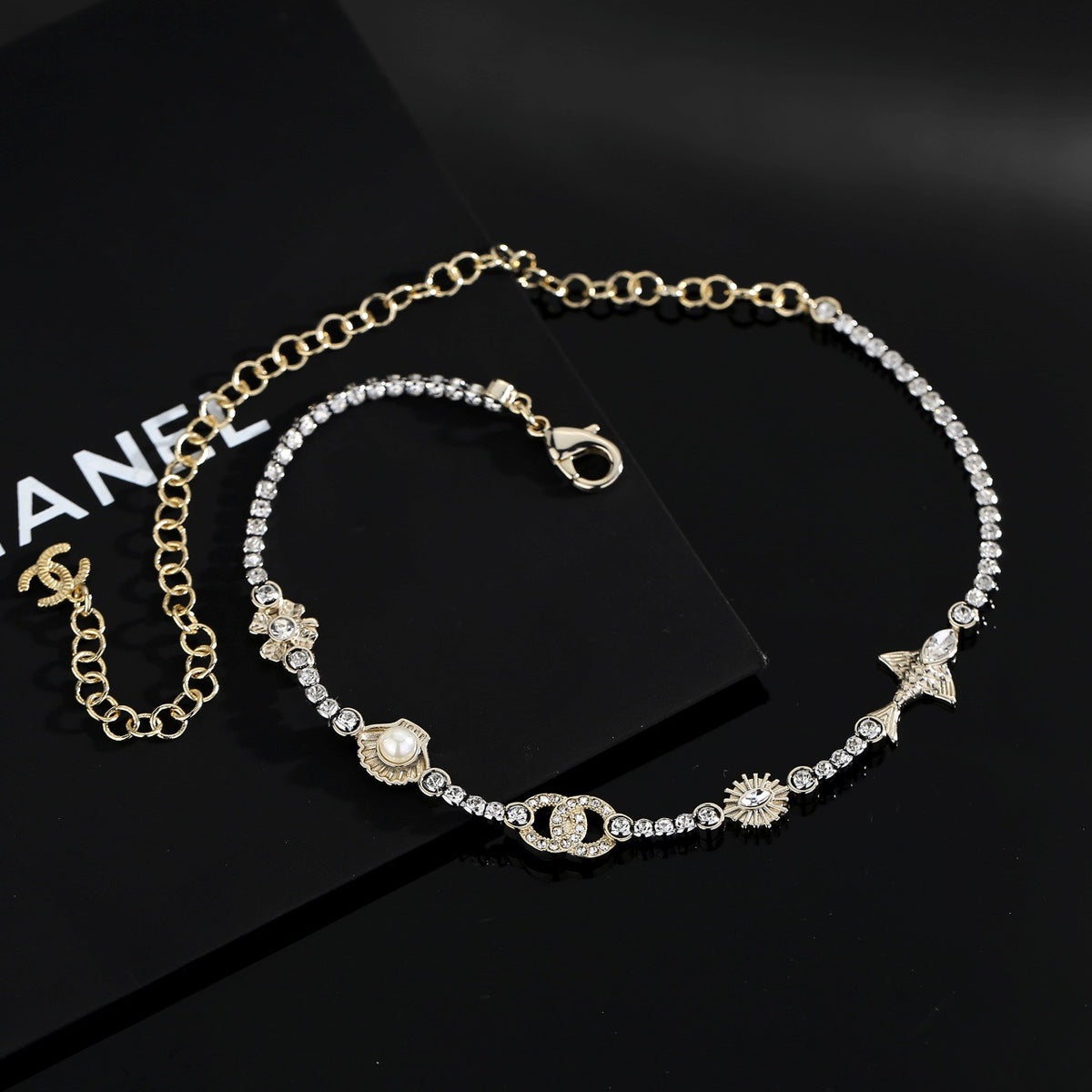 Chanel Interlocking C Shell Gold-Tone Pearl Pendant Necklace - album image 2