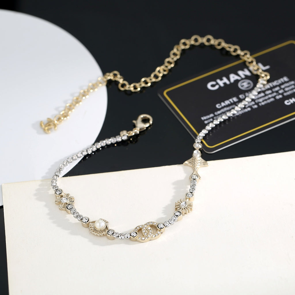 Chanel Interlocking C Shell Gold-Tone Pearl Pendant Necklace - album image 5