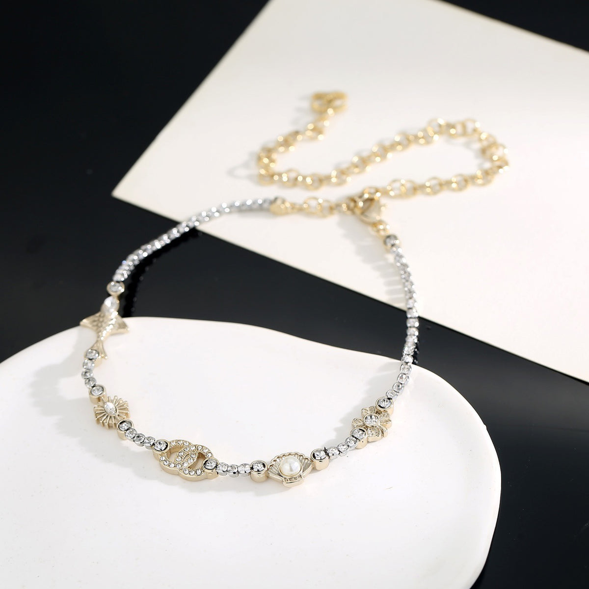 Chanel Interlocking C Shell Gold-Tone Pearl Pendant Necklace - album image 1
